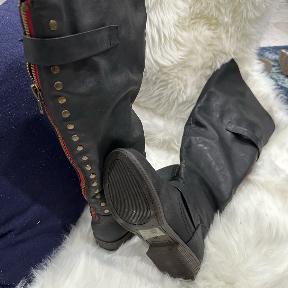 Edgy steampunk knee high boots. Very unique and very comfortable.